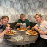 Tasting pizza during pizza class